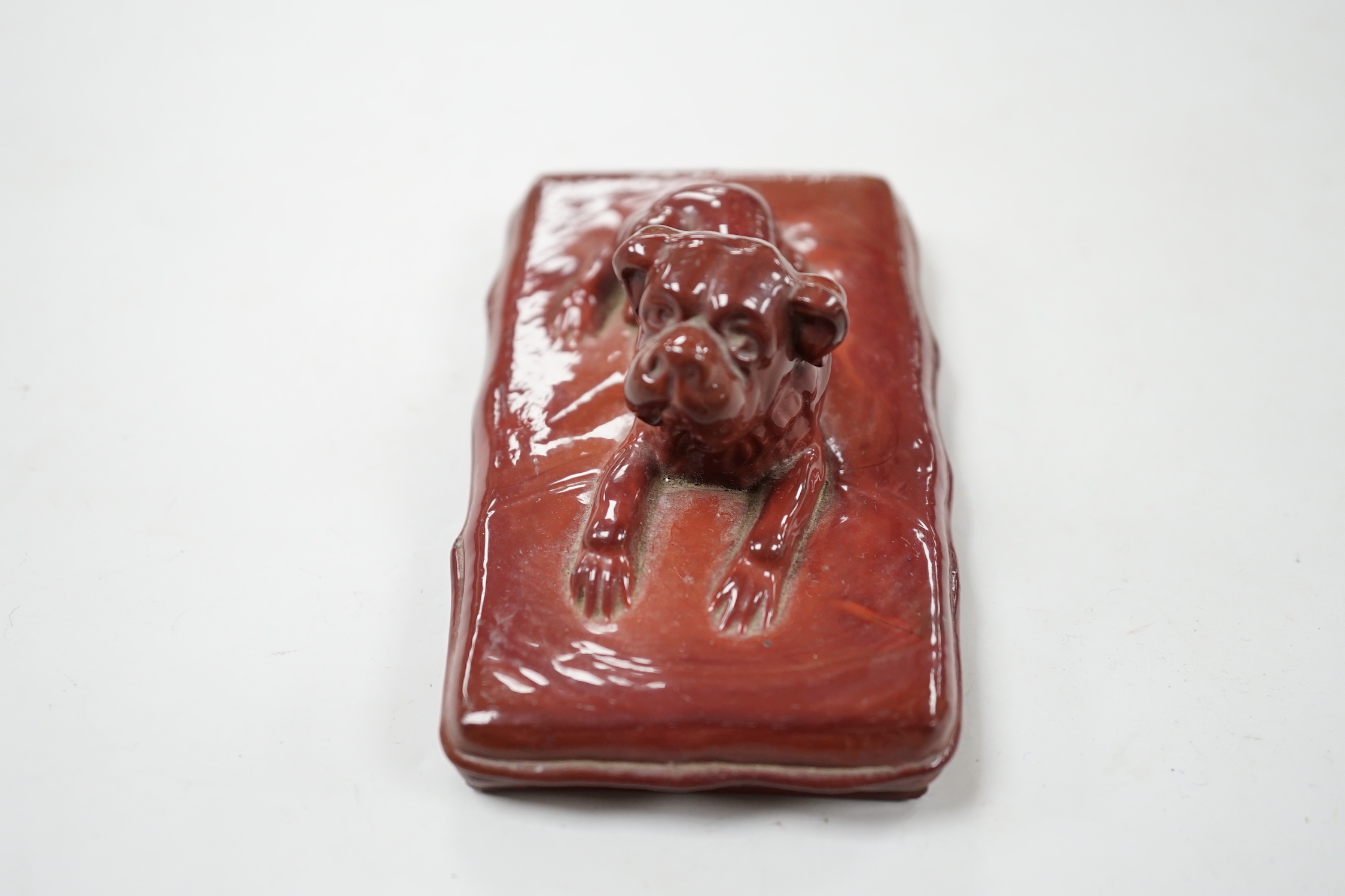 A German ‘agate’ glass model of a dog, 11.5cm wide